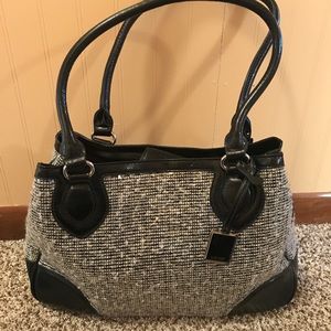 Silver and black handbag